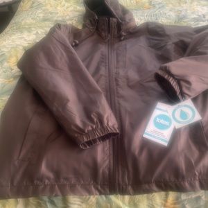 Brand new/ never been worn totes water resistant , fleece lined storm jacket.